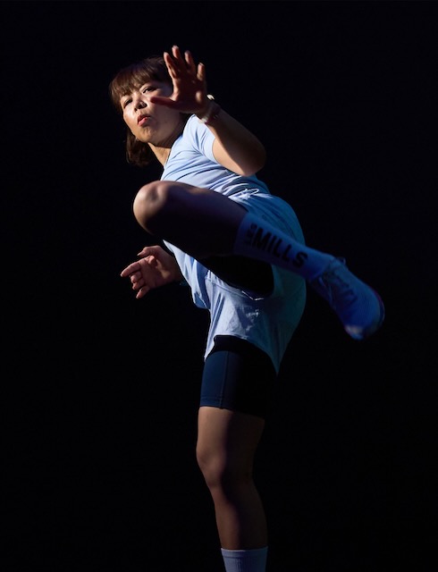 Athlete performing high kick
