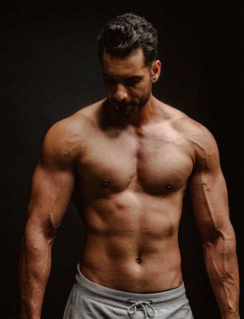 Shirtless man standing