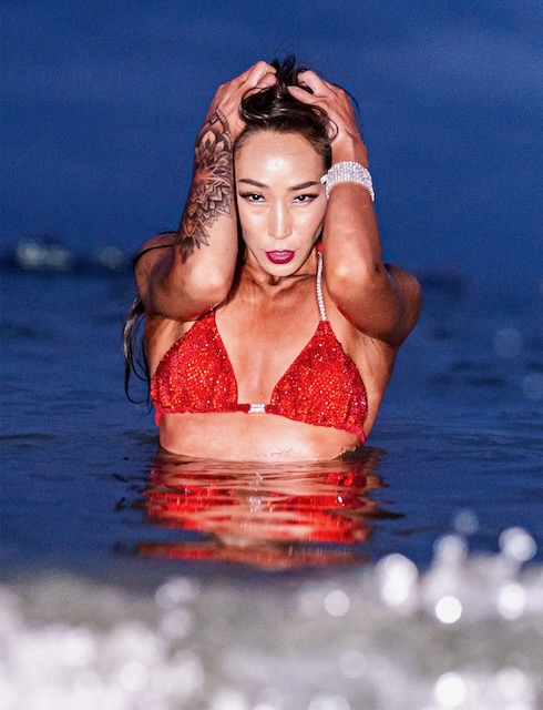 Woman in red bikini in water