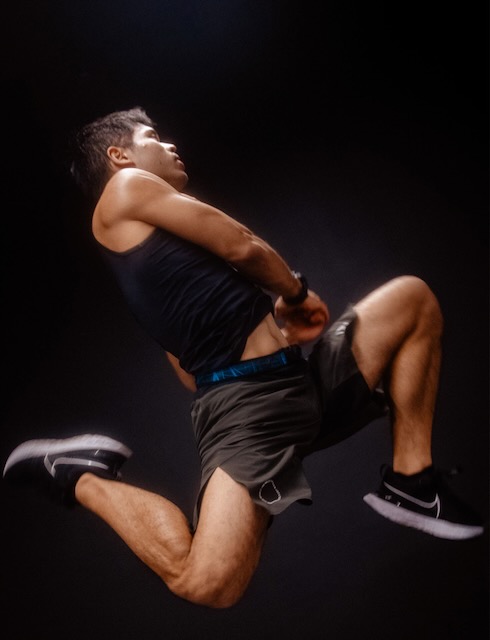 Athlete lunging in gym