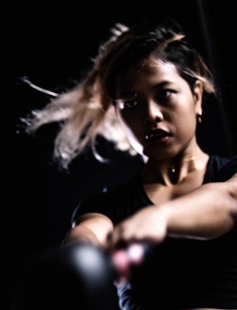 Woman in dramatic low light portrait